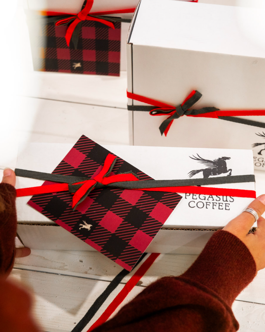 Pegasus Coffee Gift Boxes come wrapped in ribbon and ready to go under the tree