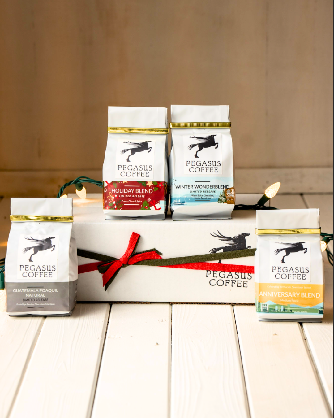 Pegasus Coffee Gift Box In front of ribbon-wrapped box